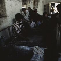 Hand disbursing fibers on mould, Erandol, Maharashtra, India, 1985